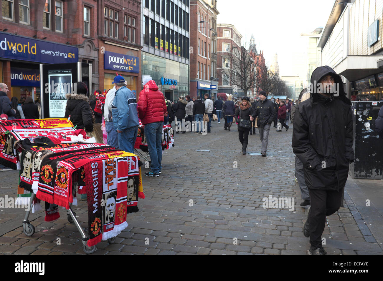 Manchester  UK  13th December 2014 A stall of football scarves in Market Street. Christmas Shopping  Manchester, UK Credit:  John Fryer/Alamy Live News Stock Photo