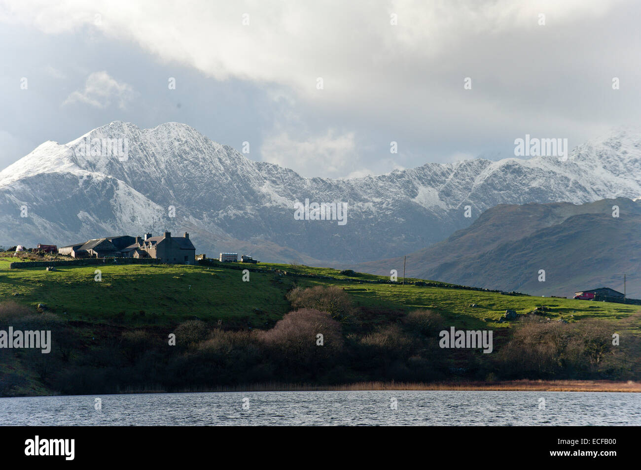 Snowdonia, Gwynedd, Wales, UK. 13th December, 2014. View Fresh snow fell last night on the summits of the Snowdonia National Park. Credit:  Graham M. Lawrence/Alamy Live News. Stock Photo