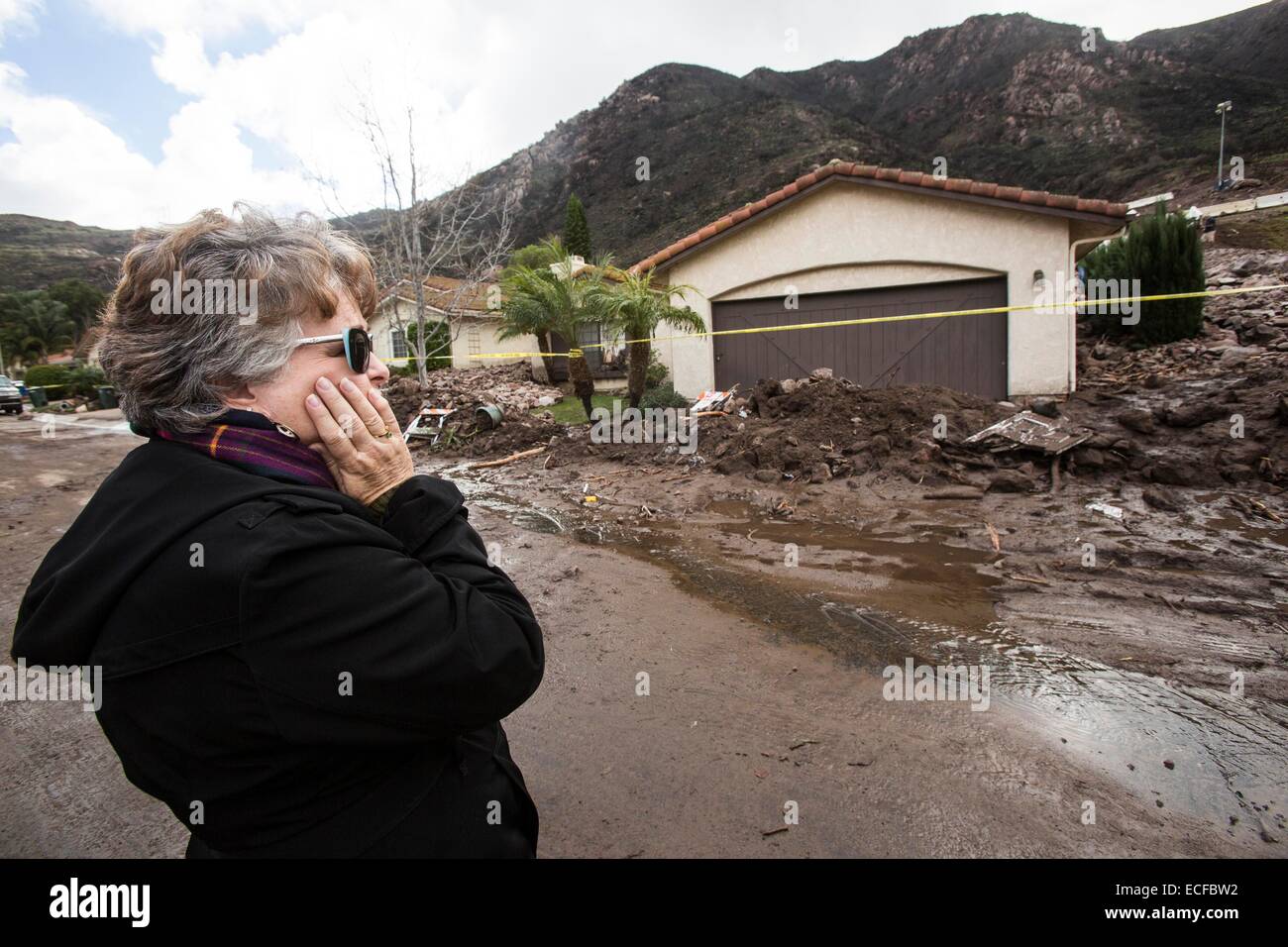 (141213) -- LOS ANGELES, Dec. 13, 2014 (Xinhua) -- Houses buried by rocks and debris are seen in Camarillo Springs, about 80km northwest to Los Angeles, California, the United States, Dec. 12, 2014. A soaking storm swept into Southern California, causing several mudslides, flooding streets and cutting power to tens of thousands Friday after lashing the rest of the state with much-needed rain. (Xinhua/Zhao Hanrong) (zjy) Stock Photo