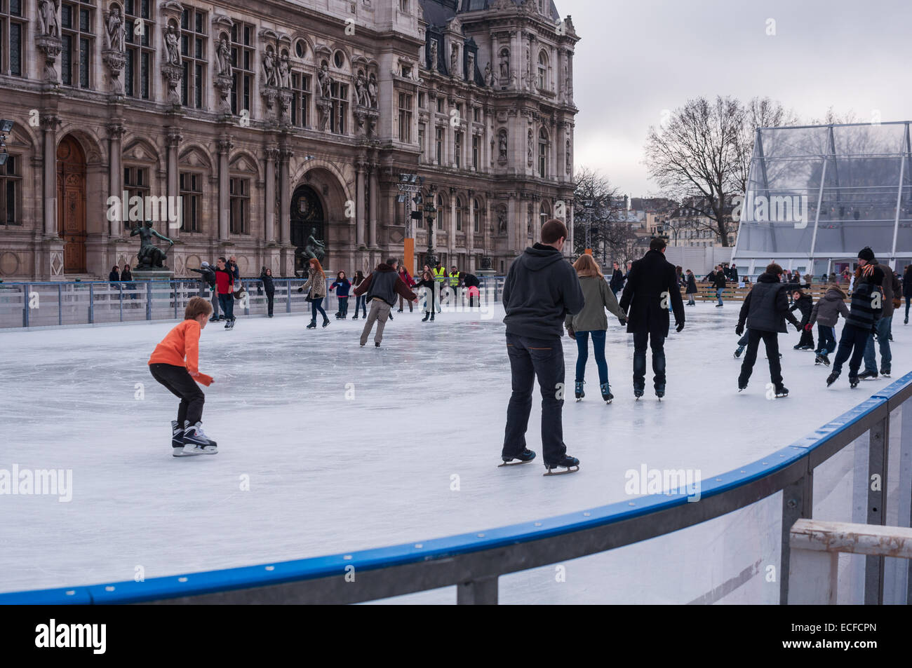 Skating on the ice rink in front of the Hotel de Ville Paris France