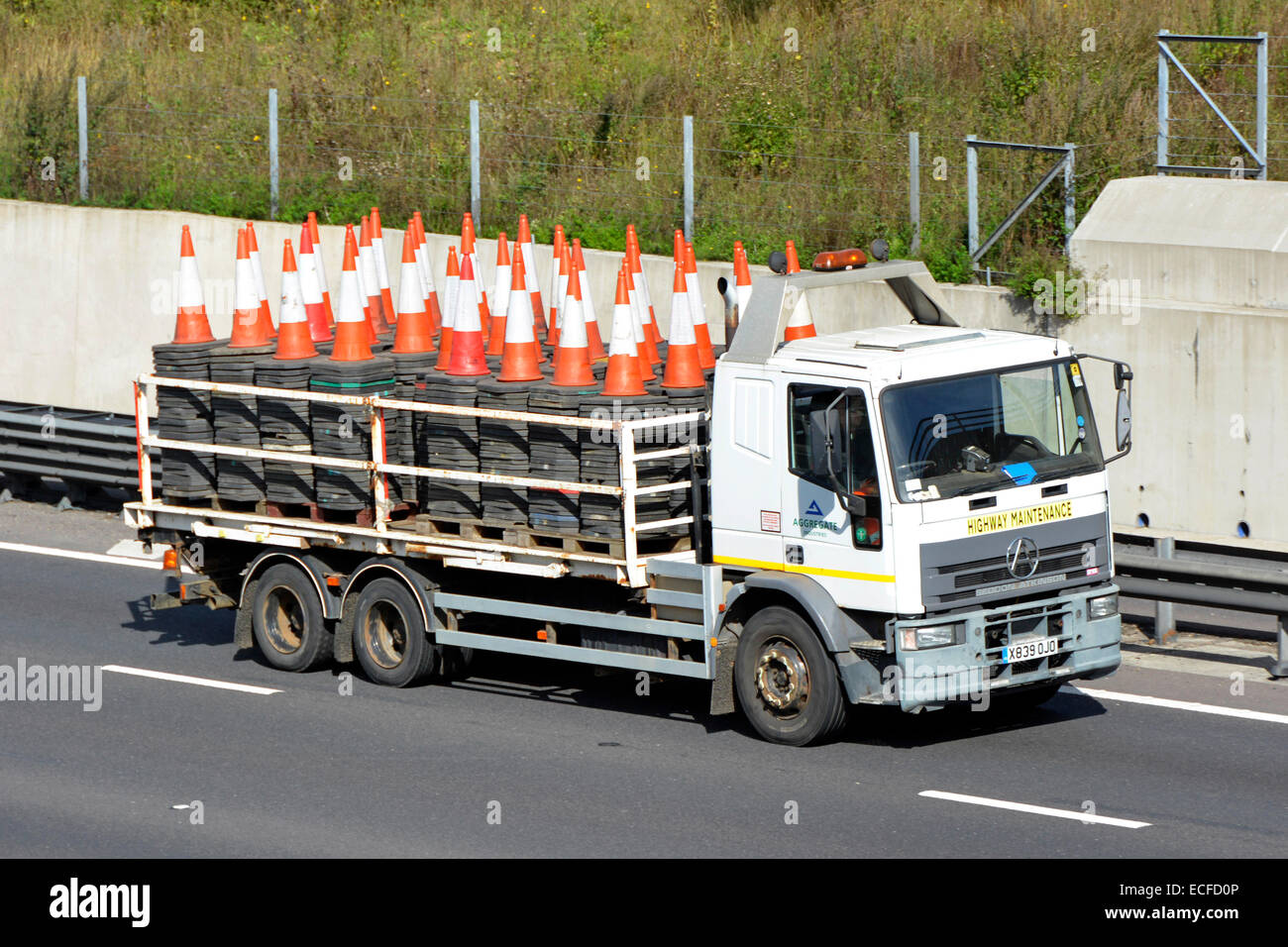 Lorry load of road cones coming to a traffic jam near you Stock Photo