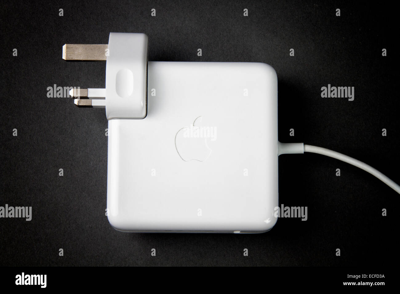 Apple computer power adaptor Stock Photo