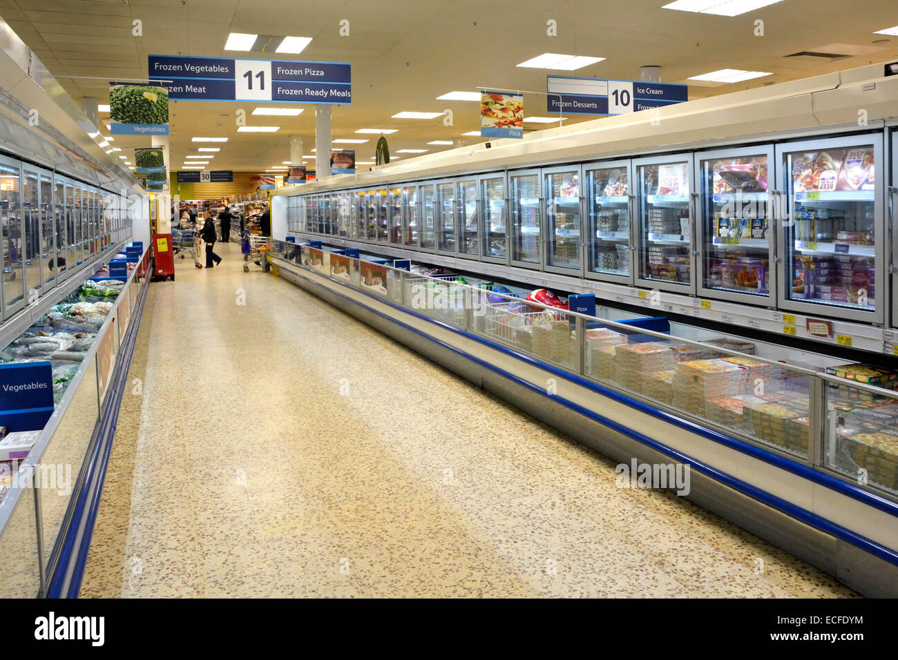 Tesco supermarket frozen food aisle and cold cabinets london england