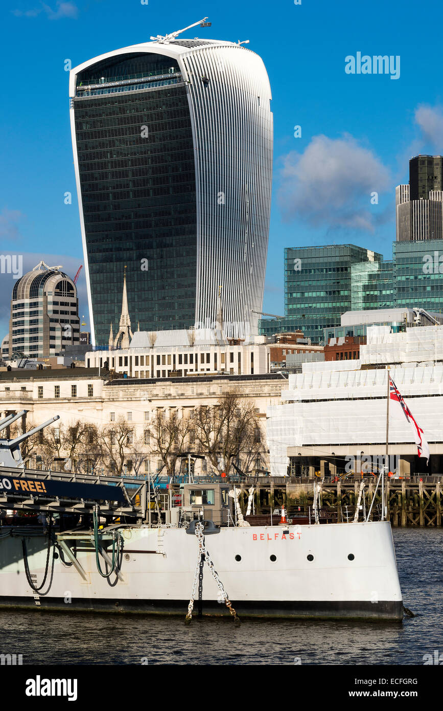 HMS Belfast Moored in Southwark on River Thames with Skyscraper 20 Fenchurch Street in City of London England United Kingdom UK Stock Photo