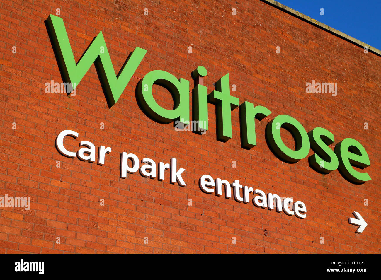 Waitrose branding and logo on the side of the store in Hythe, Hampshire, England, UK in December 2014. Stock Photo
