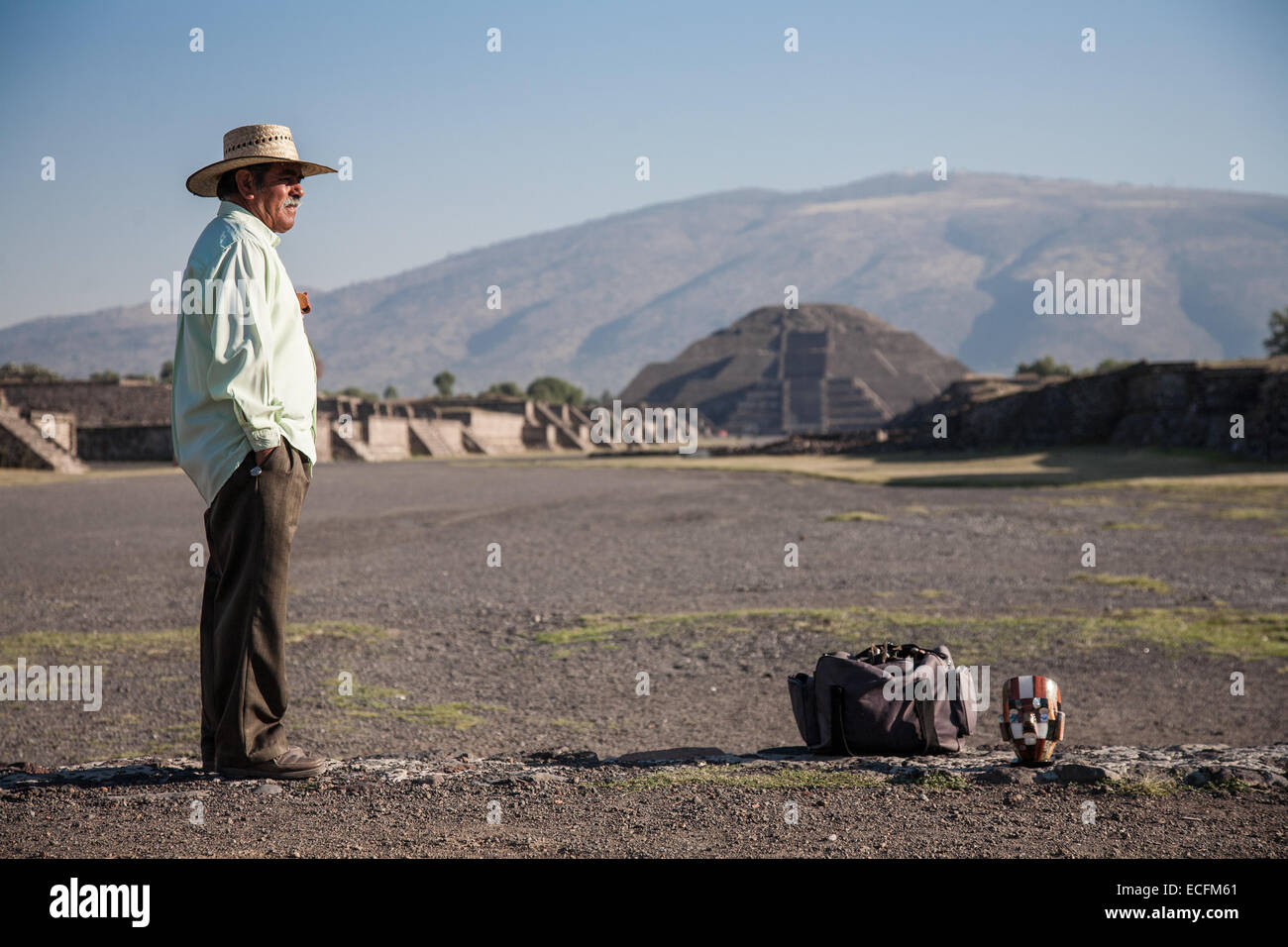 Teotihuacan, Mexico, -MARCH, 3, 2012: Unknown man  selling souvenirs in Teotihuacan in the morning, on the Avenue of the Dead Stock Photo