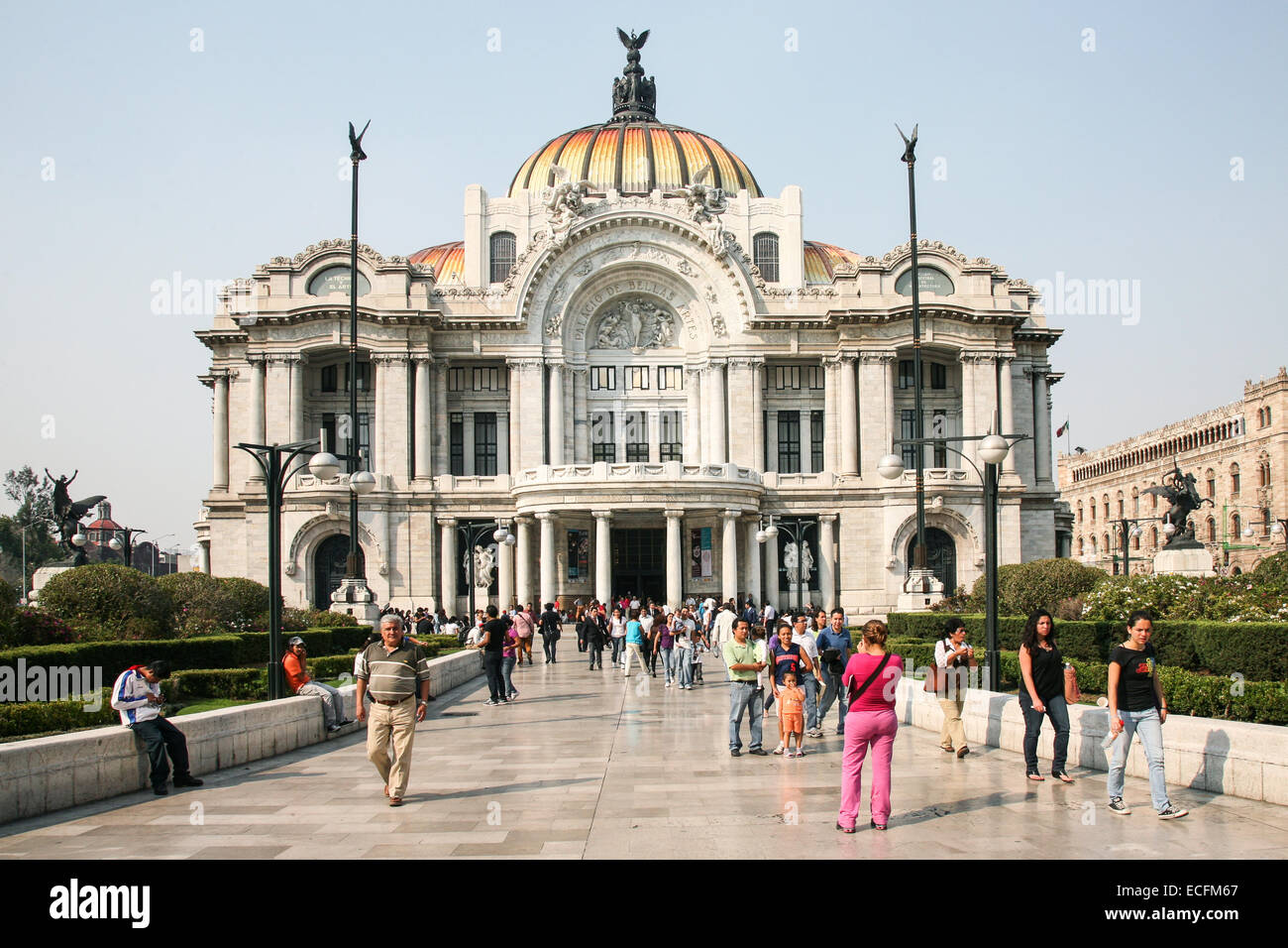 MEXICO CITY, Mexico, -MARCH, 3, 2012: Mexican people passing by the Palacio de Bellas Artes on march 3, 2012 in historical cente Stock Photo