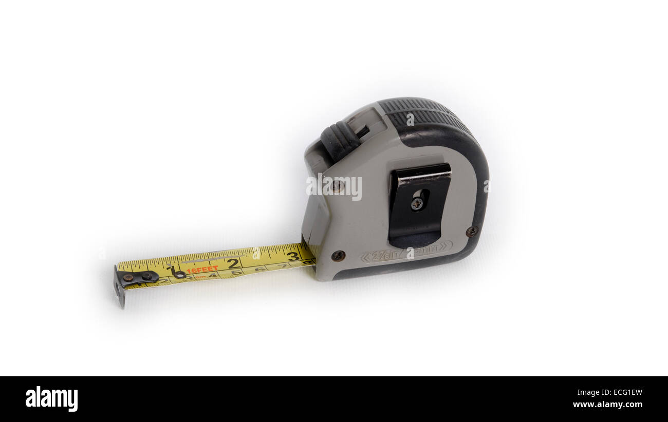 Measuring tape marked in inches,feet and metric isolated on white