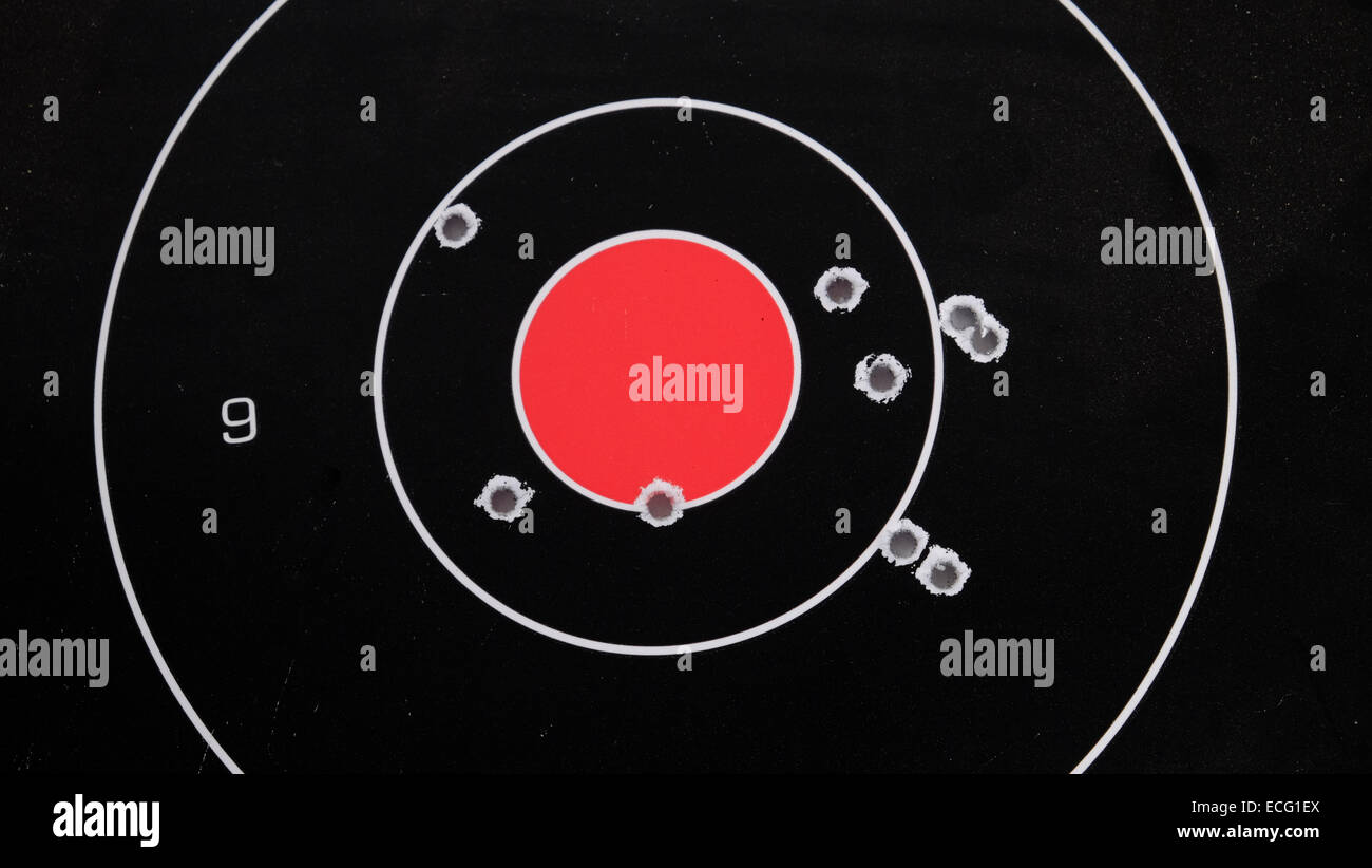 Bulls eye target with hits on target Stock Photo
