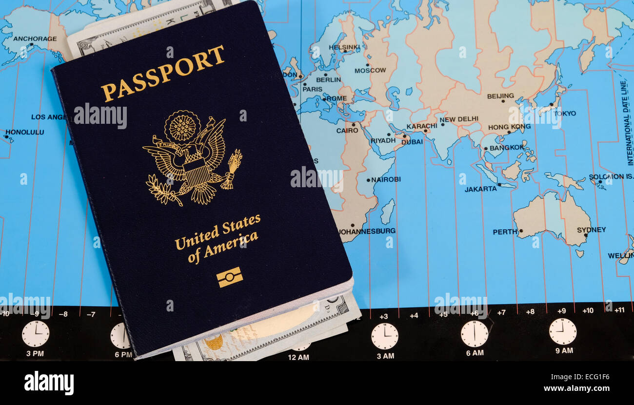 US Passport and currency on world time zone map Stock Photo