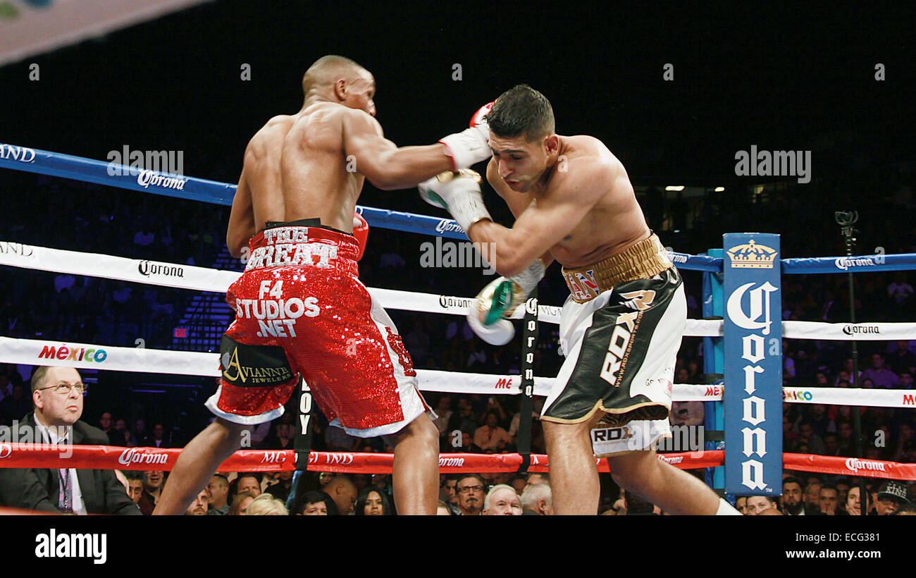 Las Vegas, Nevada, USA. 14th Dec, 2014. Boxers Amir Khan (white gloves ...