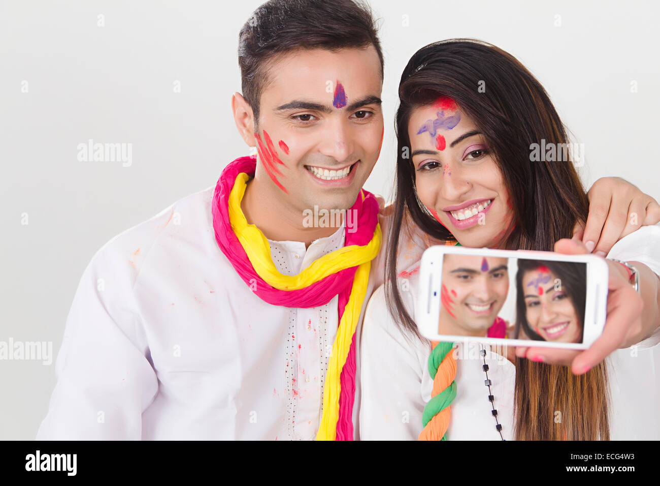 Couple posing for selfie Stock Photo - Alamy