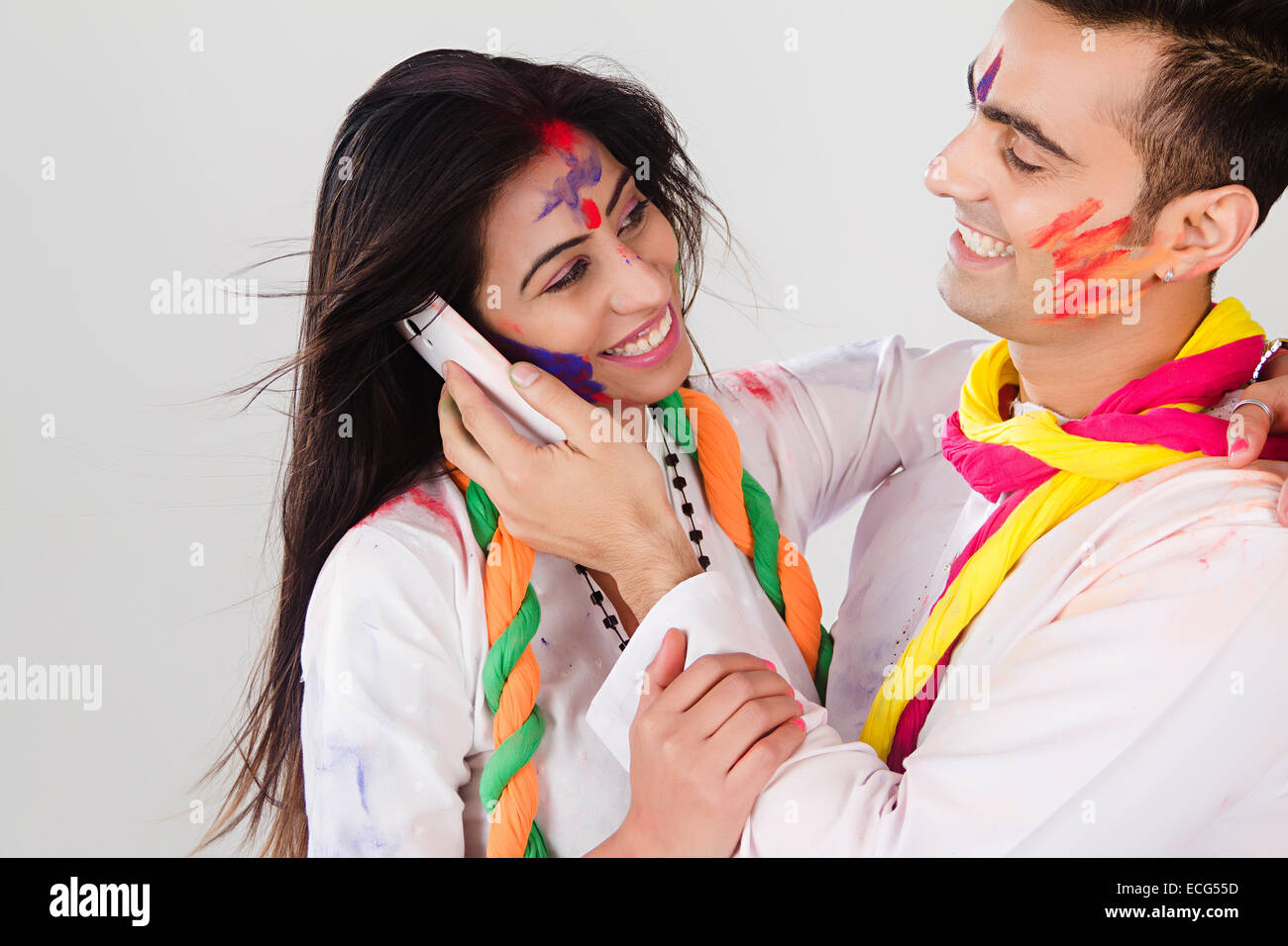 indian married couple Holi Festival talking phone Stock Photo
