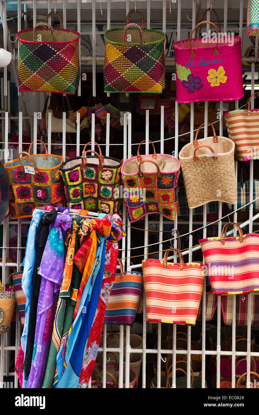 Mauritius, Mahebourg, town centre, colourful hand woven bags displayed