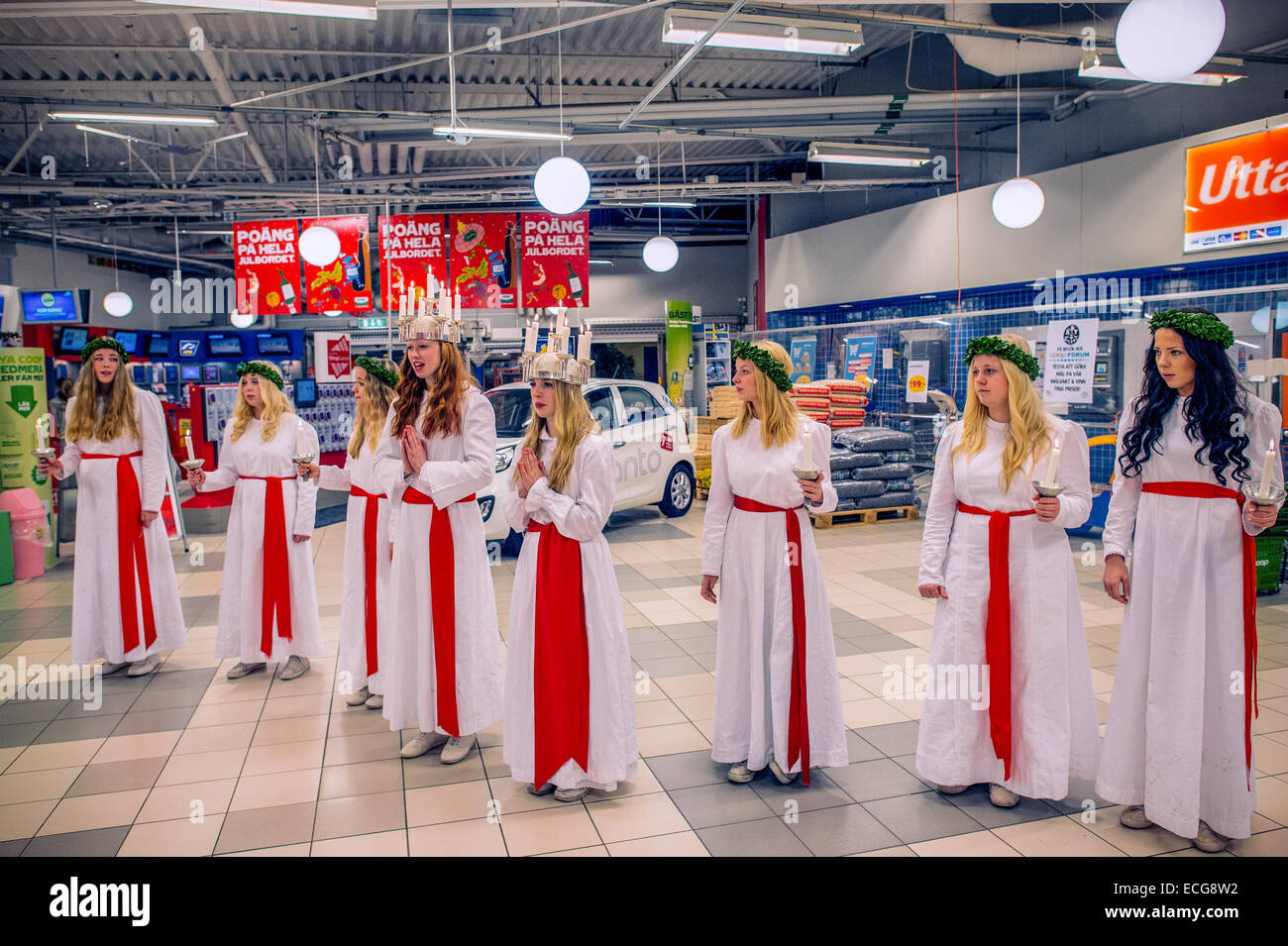 The elected Saint Lucy of Norrkoping and its Danish sister town Odense with maids. Stock Photo