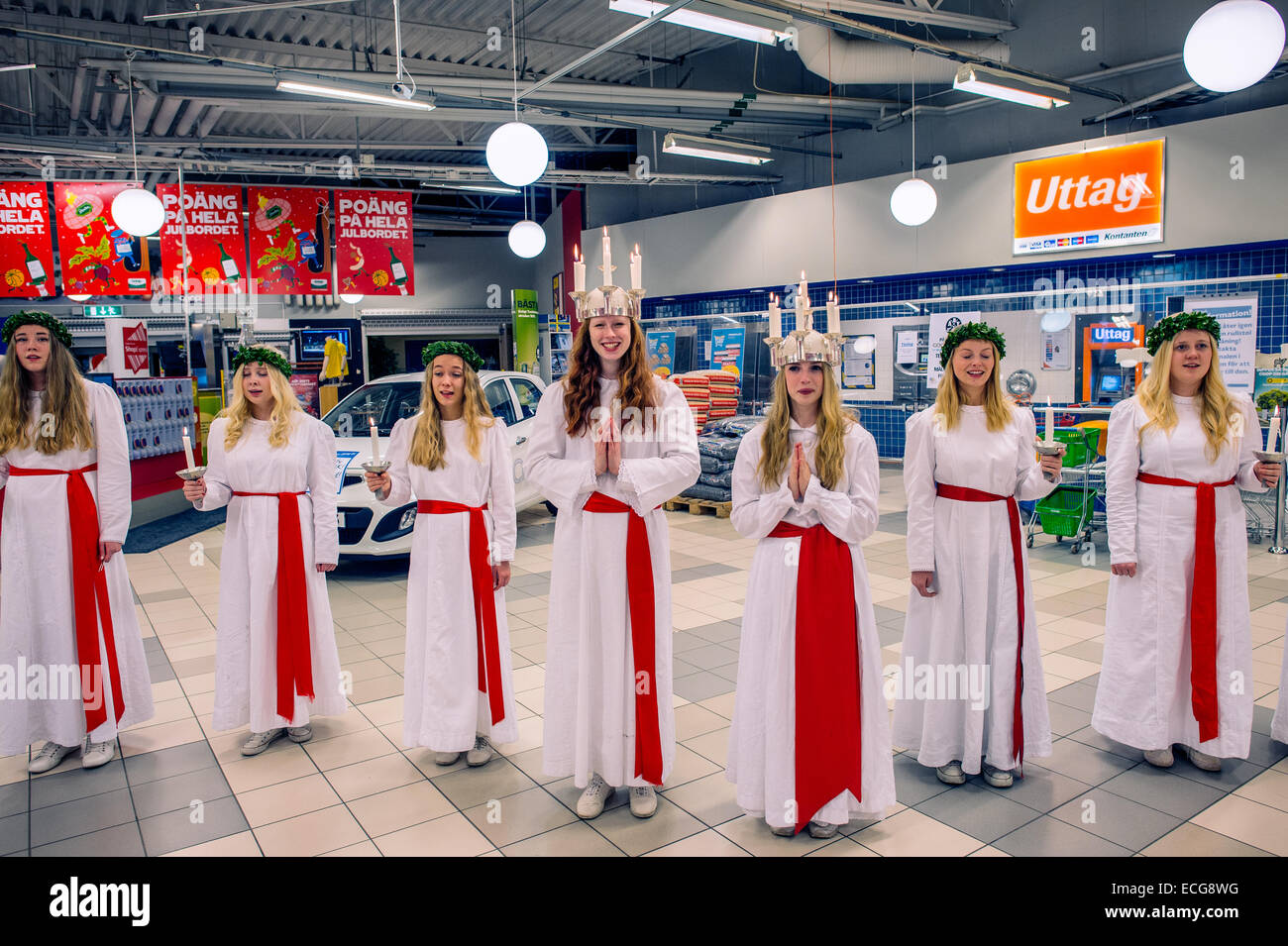 The elected Saint Lucy of Norrkoping and its Danish sister town Odense with maids. Stock Photo