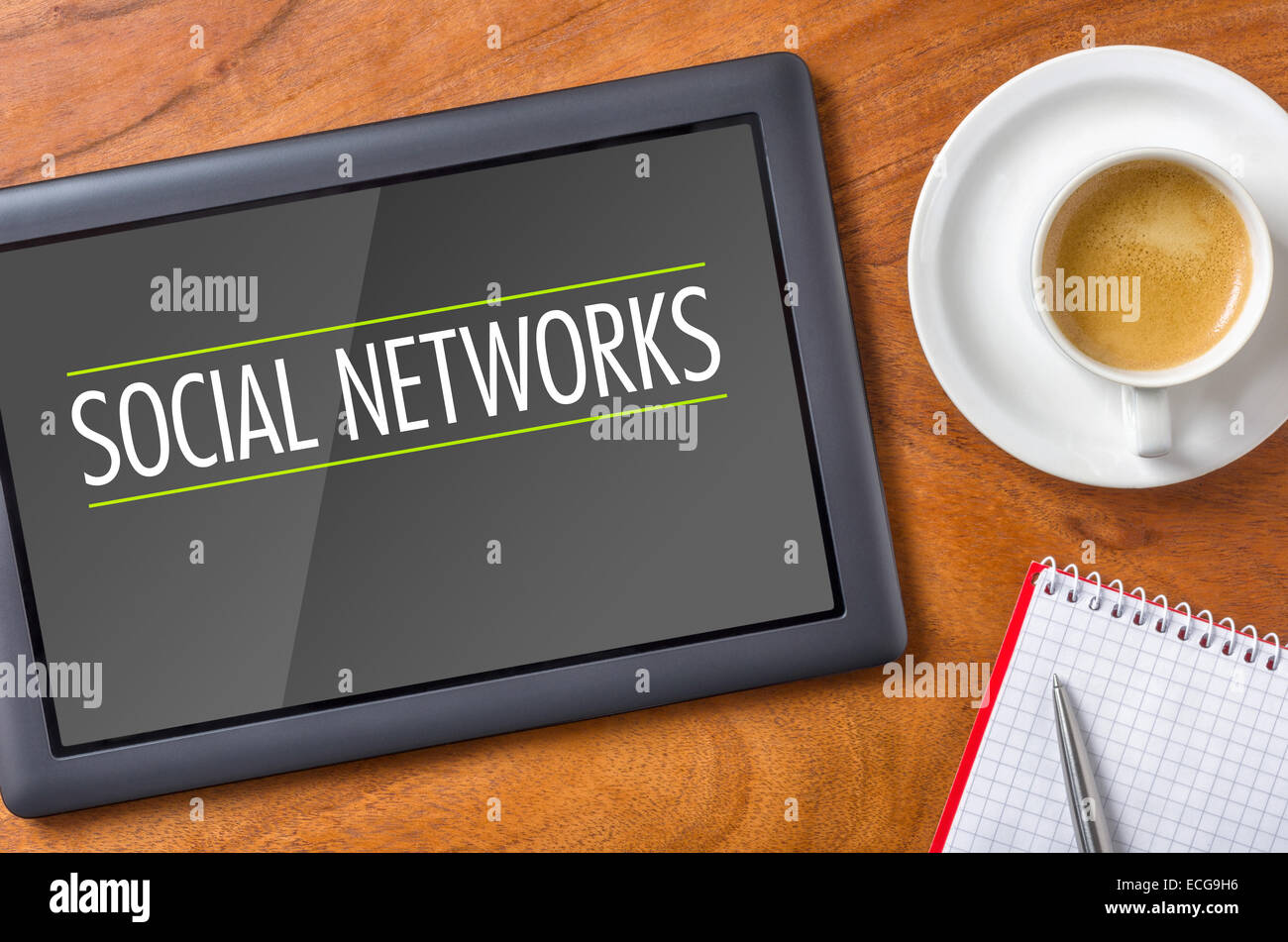 Tablet on a desk - Social Networks Stock Photo