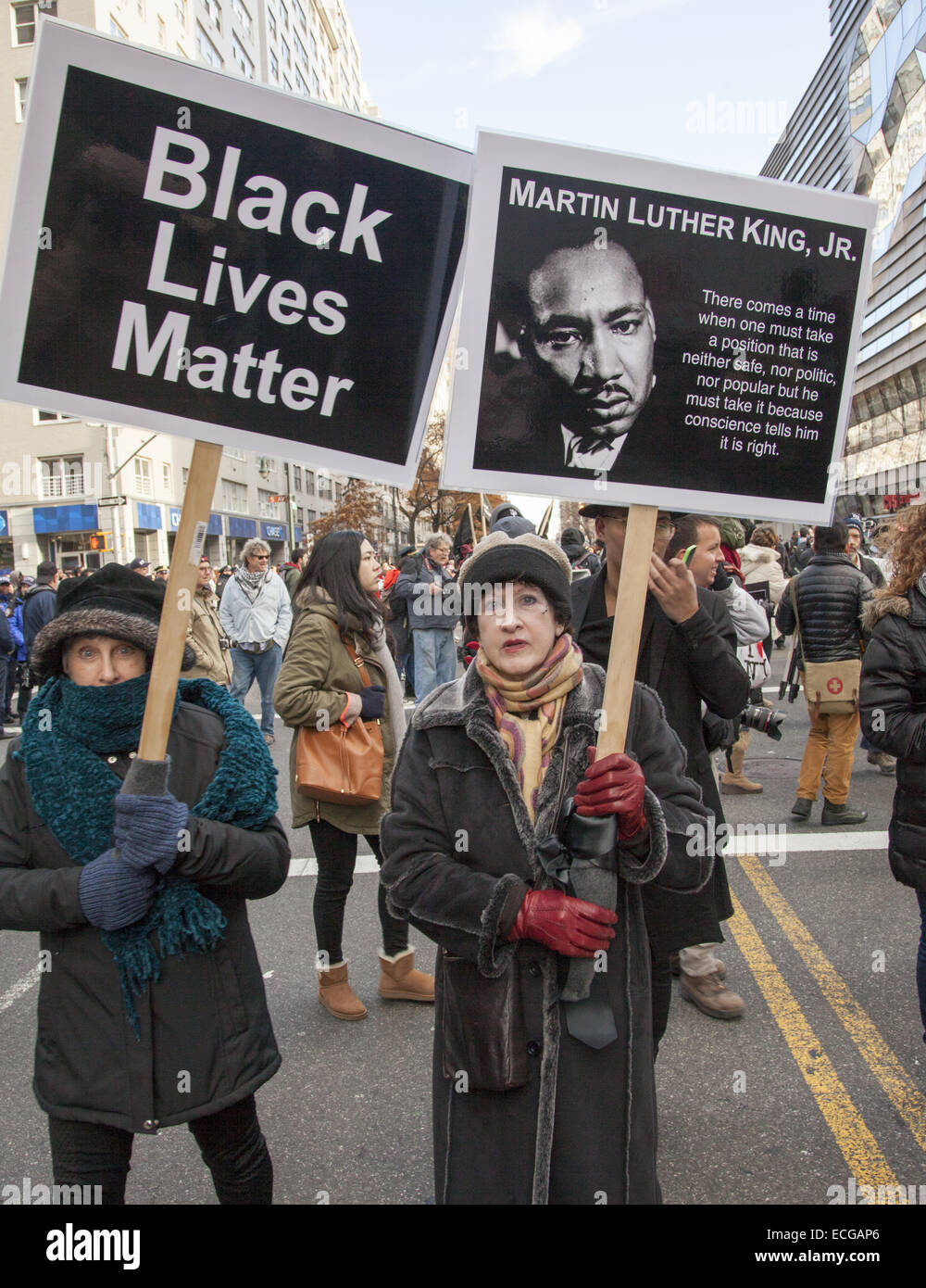 Sparked by the Grand Jury verdicts in Ferguson and the Eric Garner murder in NYC, thousands marched in NYC against police racial bias & the killings of unarmed black men all over the USA. Stock Photo