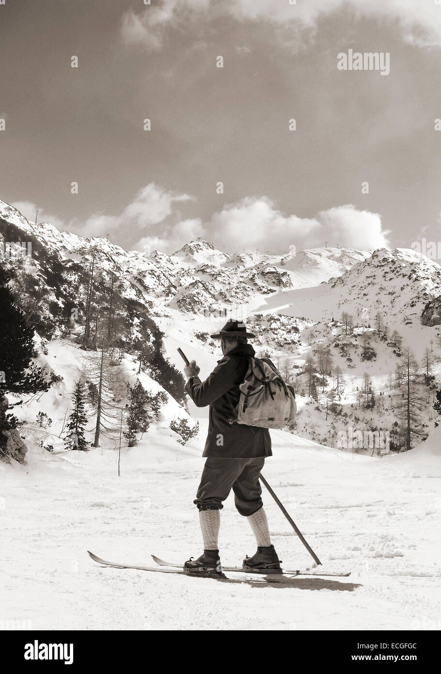 Vintage photos old skier with traditional old wooden skis Stock Photo