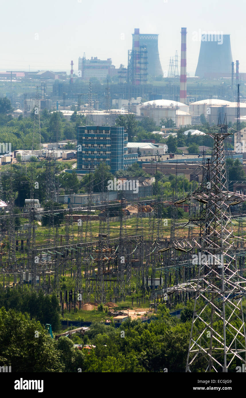 Extreme industry area with CHP, refinery and electric lines Stock Photo
