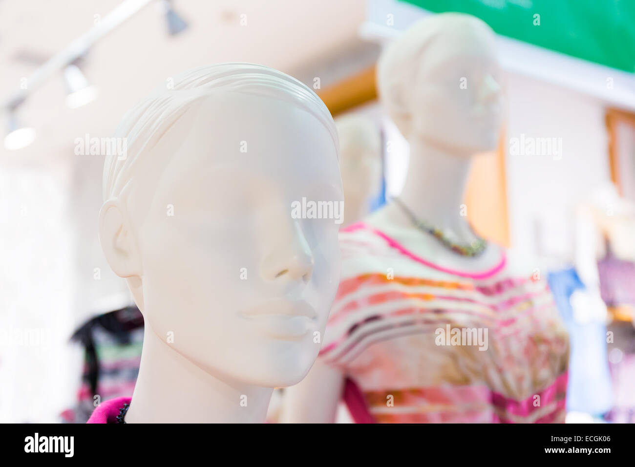 White mannequins in city mall Stock Photo - Alamy