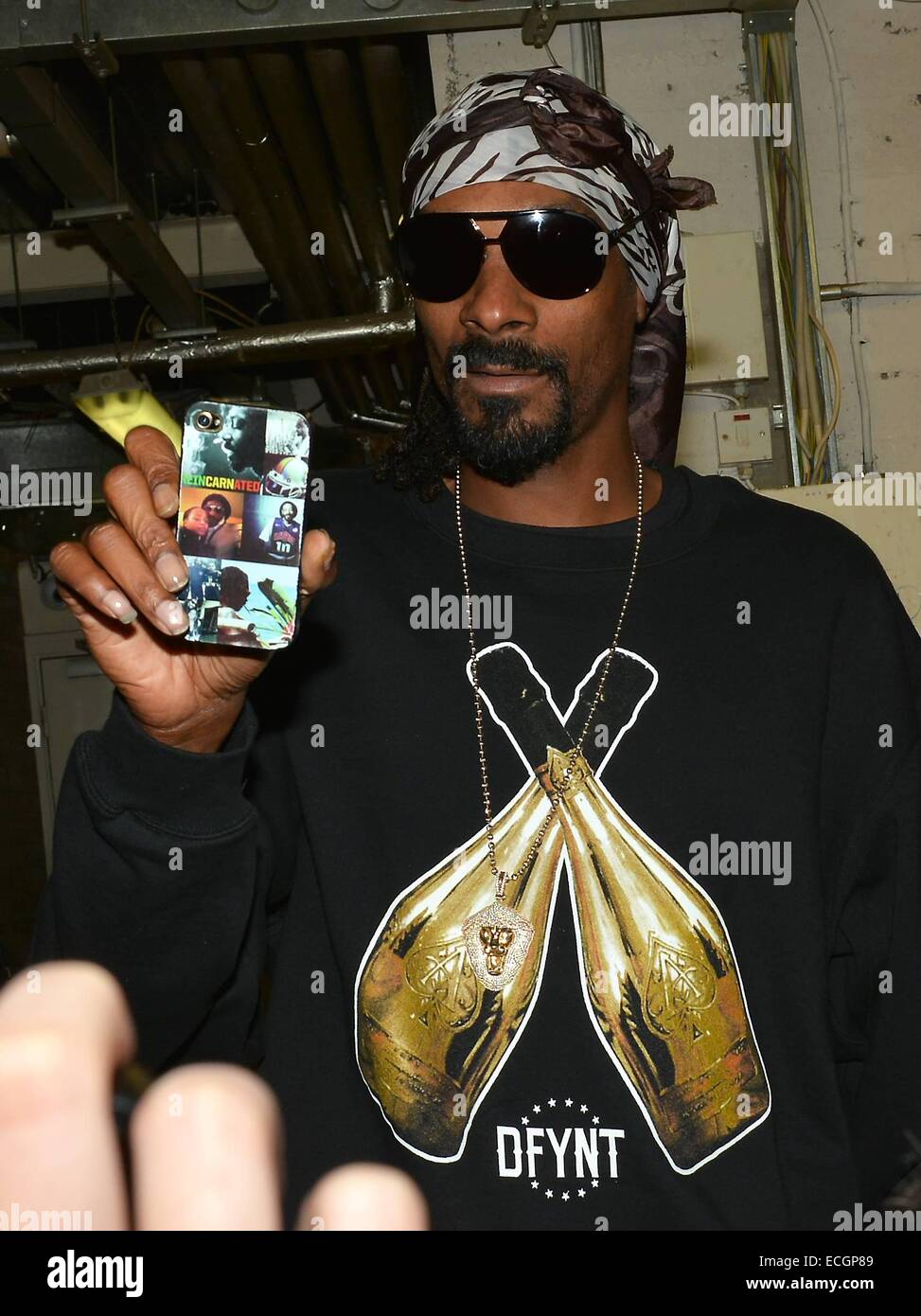 Rapper Snoop Dogg films fans on his custom iPhone as he arrives at The Academy for his concert  Featuring: Snoop Doff Where: Dublin, Ireland When: 11 Jun 2014 Stock Photo