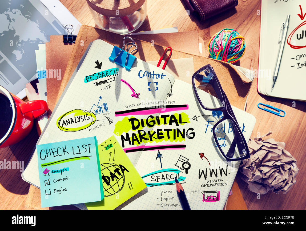 Office Desk with Tools and Notes About Digital Marketing Stock Photo