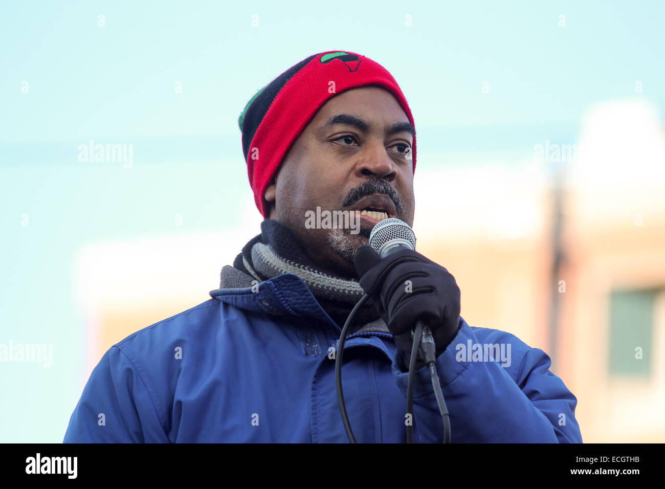 Boston, Massachusetts, USA. 13th December, 2014. A man speaks during the Millions March rally in Boston, Massachusetts, USA. The protest, like those in other cities throughout the United States on this day, is in response to recent grand jury verdicts not indicting the police officers who  killed unarmed black men Michael Brown and Eric Garner, and to the longstanding problems of racism and police brutality. Credit:  Susan Pease/Alamy Live News Stock Photo