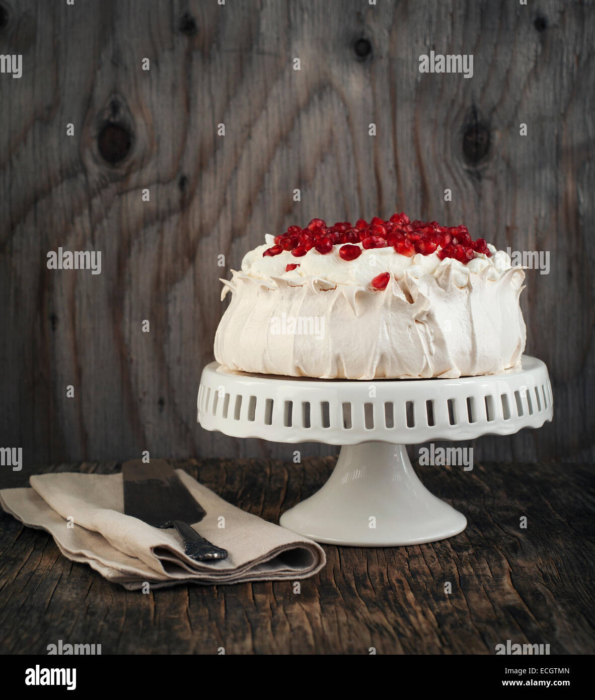 Pavlova cake with pomegranate. Meringue cake with pomegranate Stock Photo Alamy