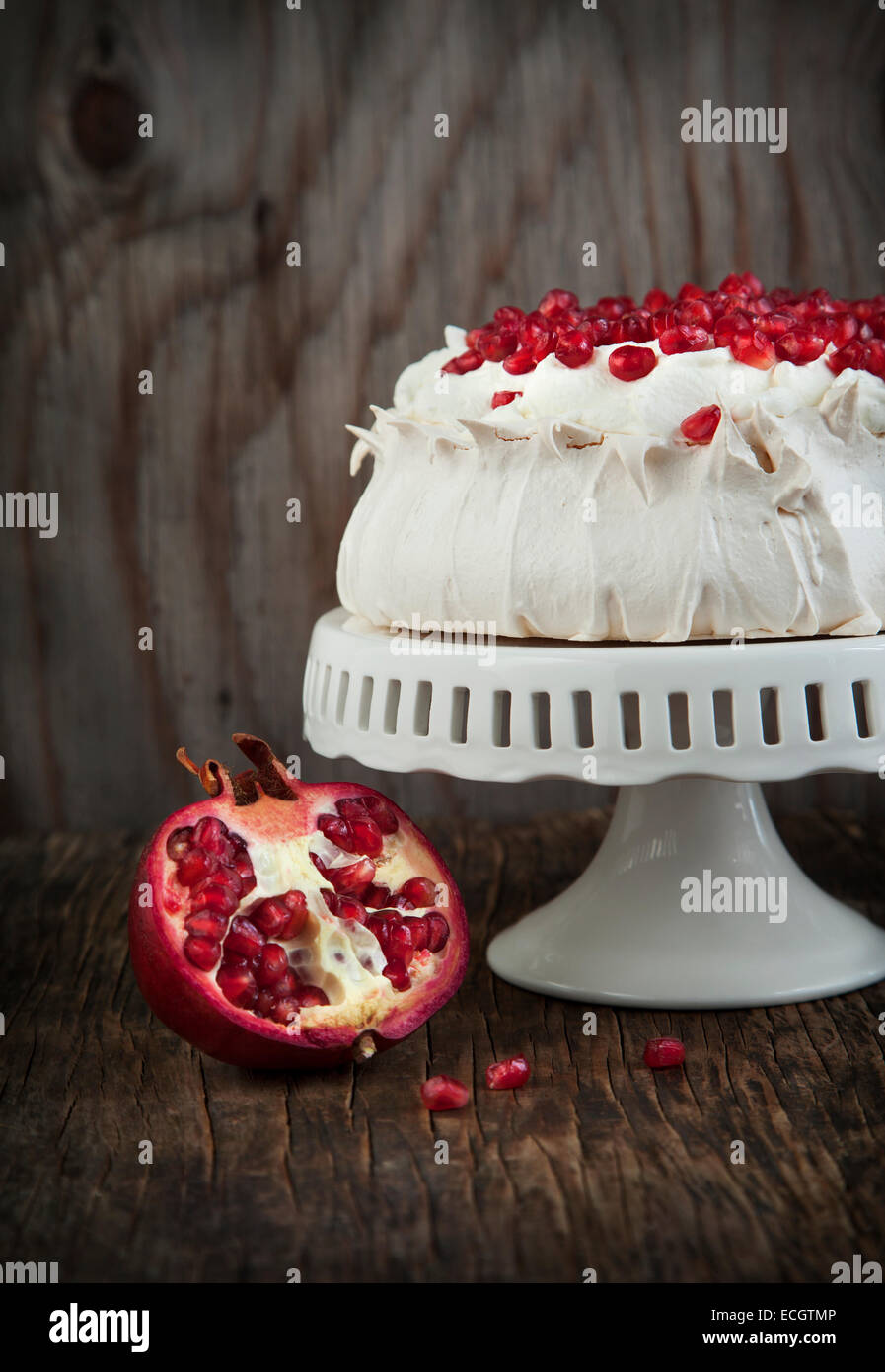 Pavlova cake with pomegranate. Meringue cake with pomegranate Stock Photo Alamy
