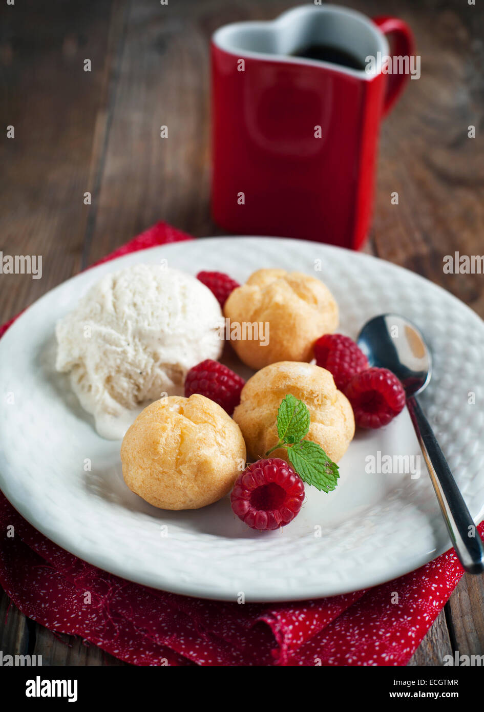 Dessert with Vanilla Ice Cream and Puff pastry filled with dairy cream Stock Photo