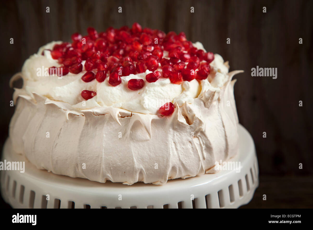 Pavlova cake with pomegranate. Meringue cake with pomegranate Stock Photo Alamy