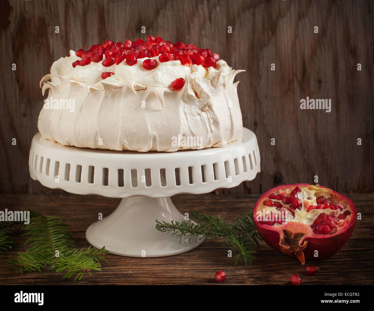 Pavlova cake with pomegranate. Meringue cake with pomegranate Stock Photo Alamy