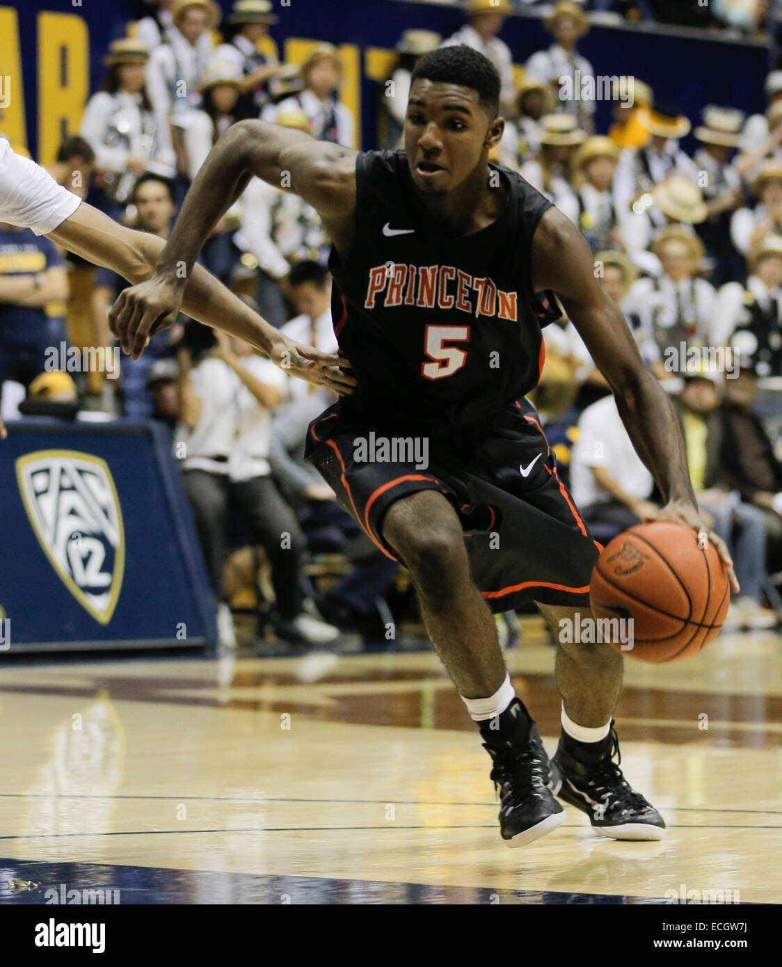 Berkeley USA CA. 13th Dec, 2014. Princeton G # 5 Amir Bell at the top of the key drive in the paint and score during NCAA Men's Basketball game between Princeton Tigers and California Golden Bears 57-67 lost at Hass Pavilion Berkeley Calif. © csm/Alamy Live News Stock Photo