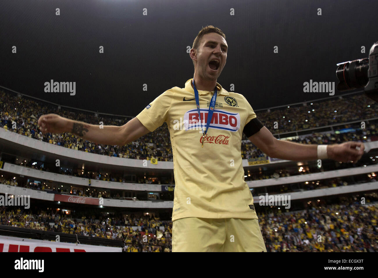 Mexico City, Mexico. 14th Dec, 2014. America's Miguel Layun celebrates at the end of the return match of the Final of the 2014 Opening Tournament of the MX League against Tigres in the Azteca Stadium in Mexico City, capital of Mexico, on Dec. 14, 2014. © Alejandro Ayala/Xinhua/Alamy Live News Stock Photo