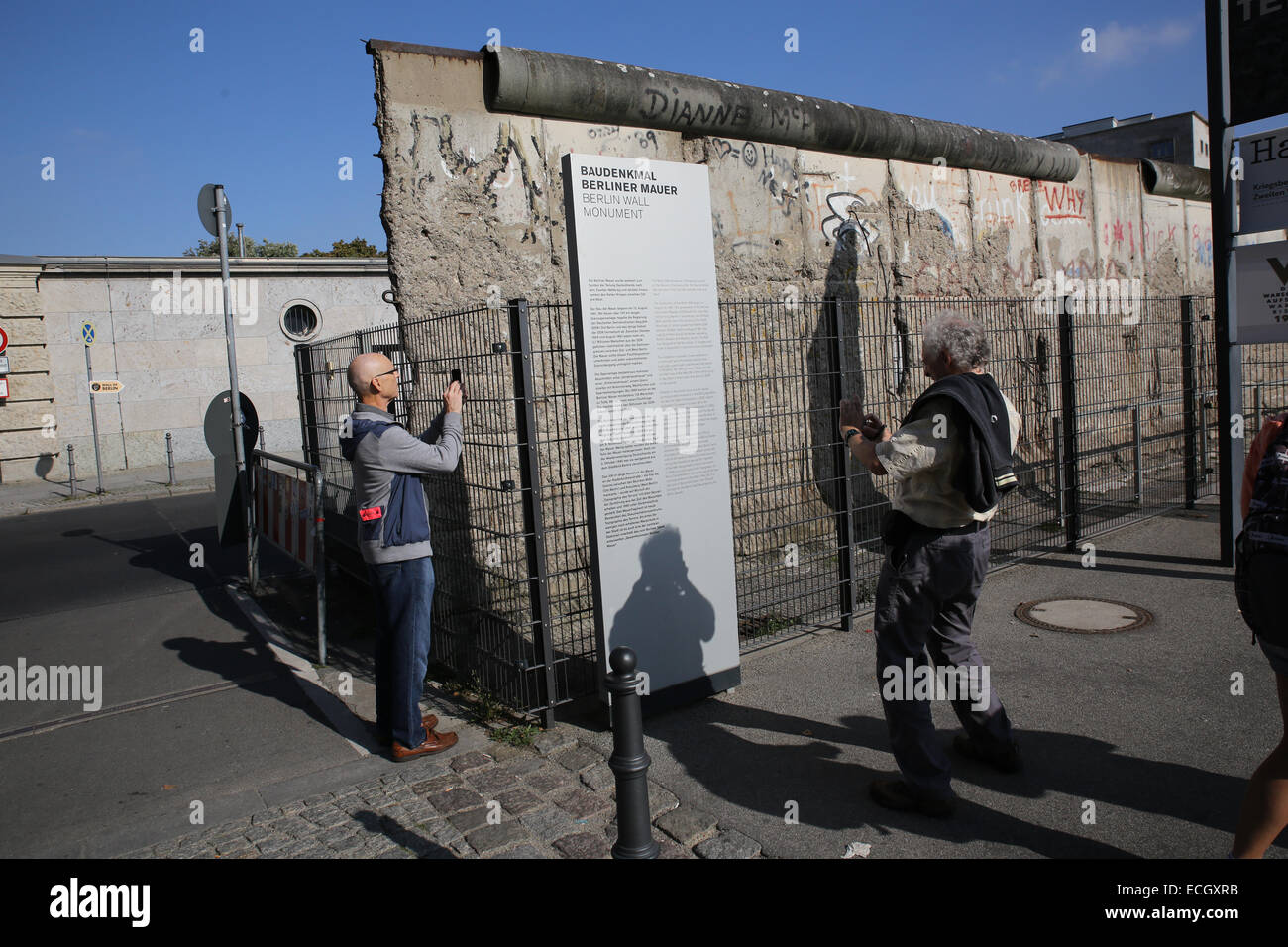 berlin wall monument tourist taking picture Stock Photo