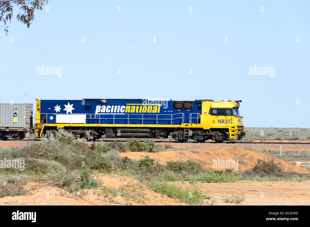 Diesel locomotives hauling freight train across plains, Cockburn, South Australia /  New South Wales border Stock Photo