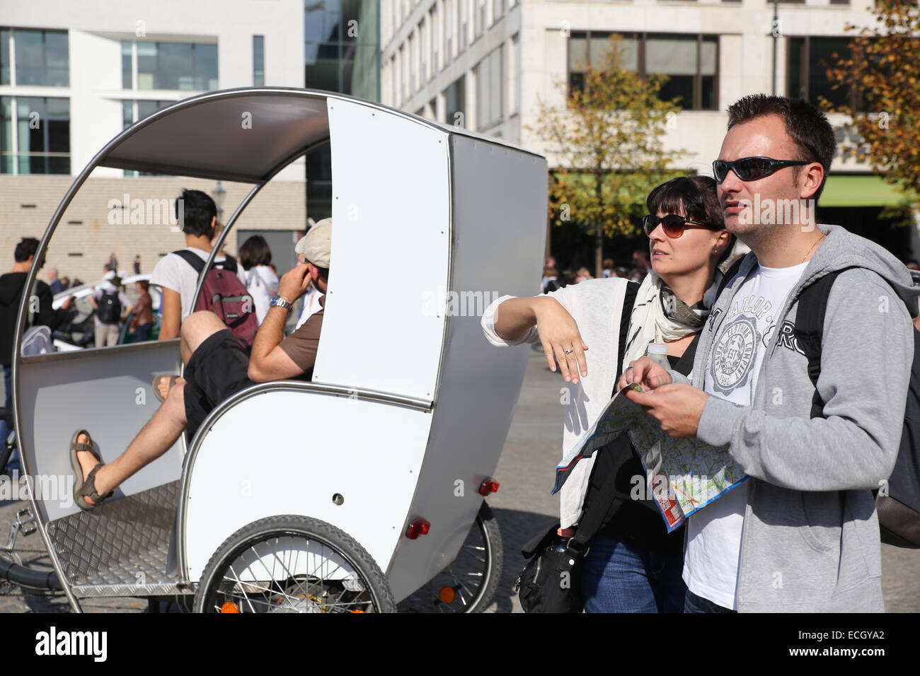 man woman tourists searching direction outdoor europe berlin germany Stock Photo