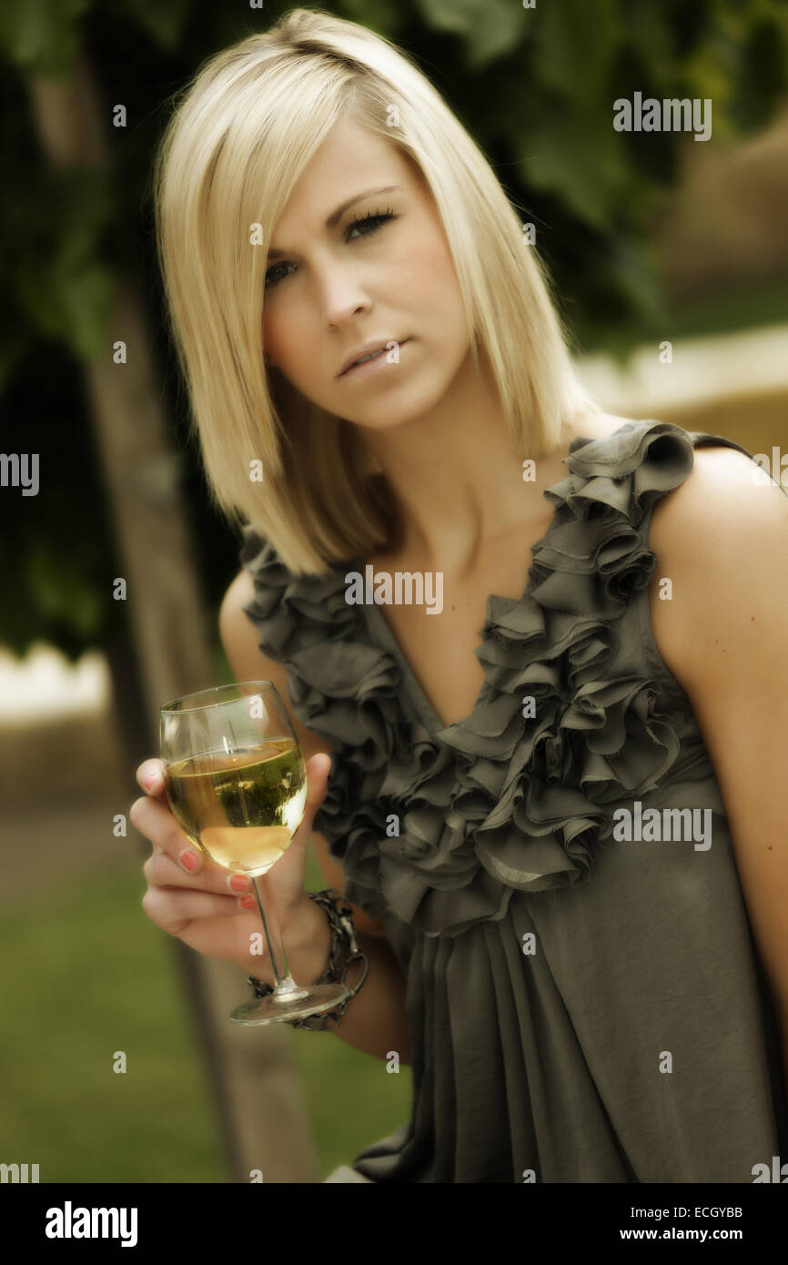 beautiful young woman with glass of wine Stock Photo - Alamy