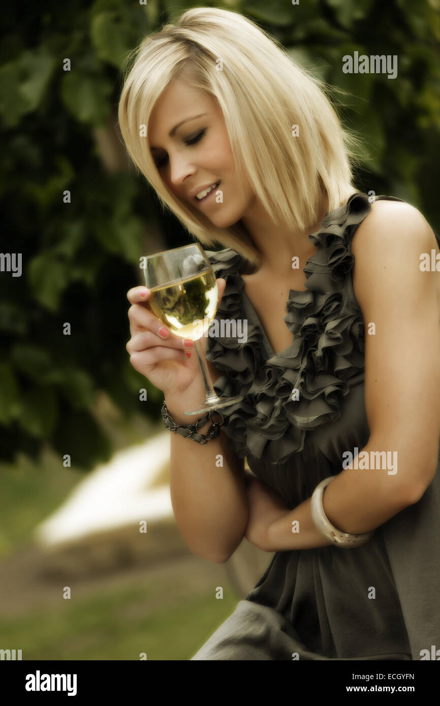 beautiful young woman with glass of wine Stock Photo - Alamy