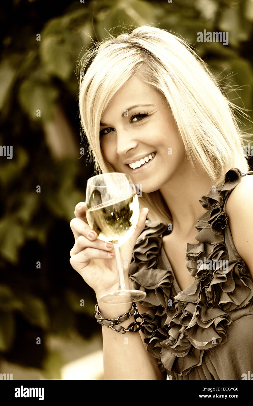 beautiful young woman with glass of wine Stock Photo - Alamy