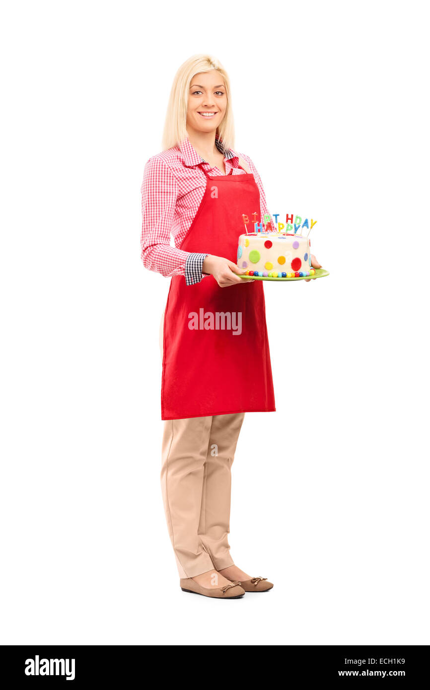 Full length portrait of a young mother holding birthday cake isolated ...