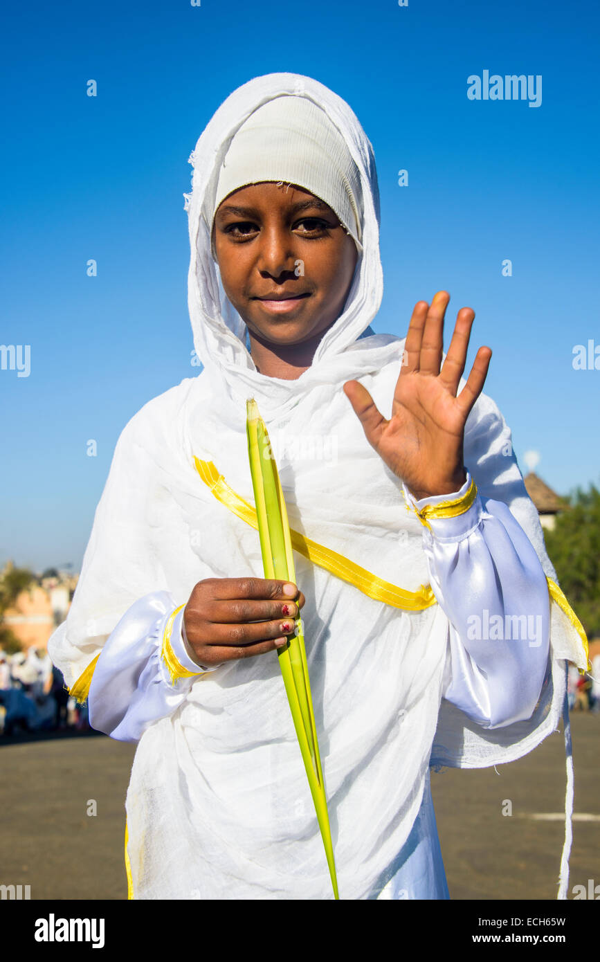 Orthodox girl praying at the Easter ceremony, Asmara, Eritrea Stock Photo