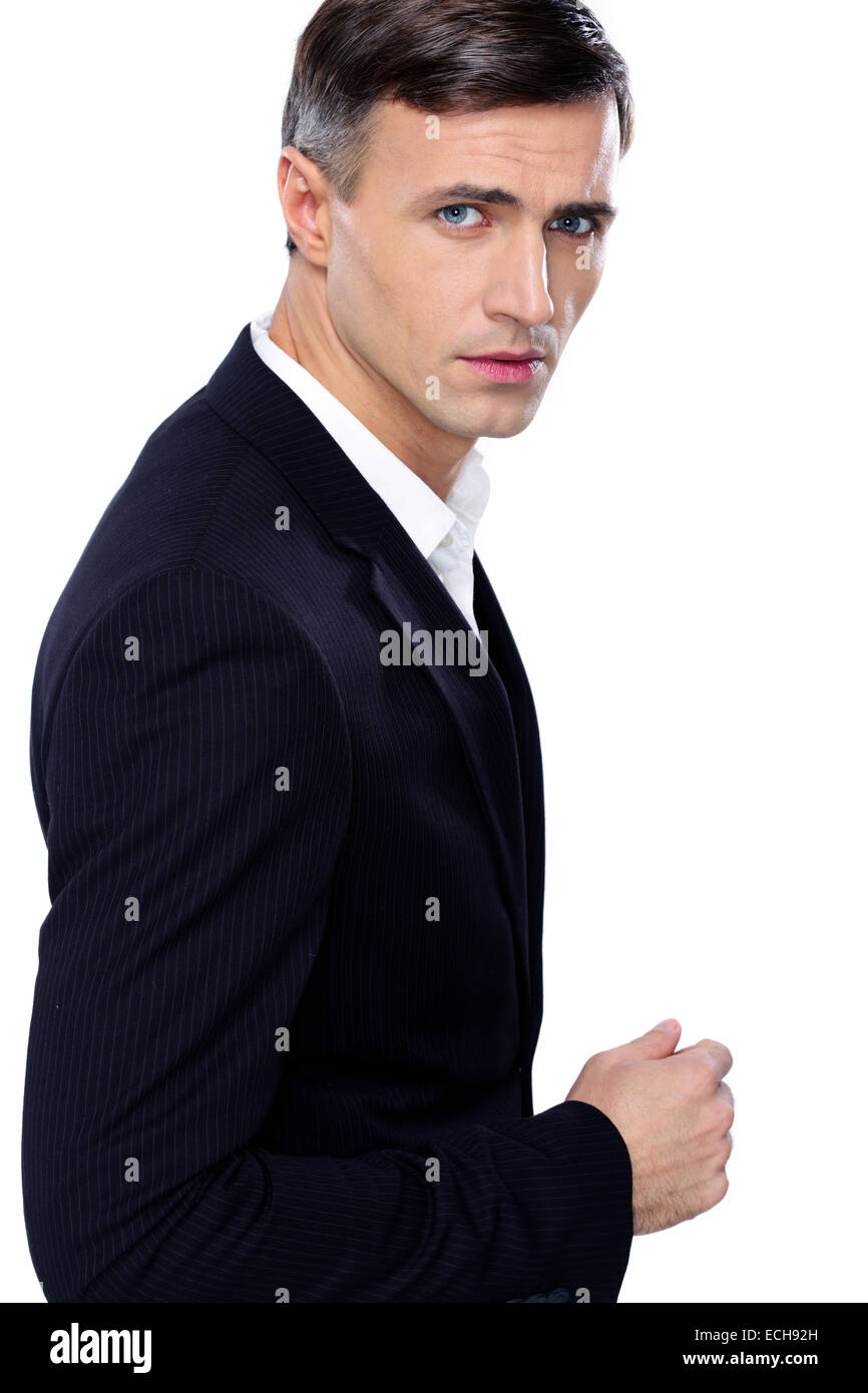 Young handsome businessman standing isolated on a white background ...
