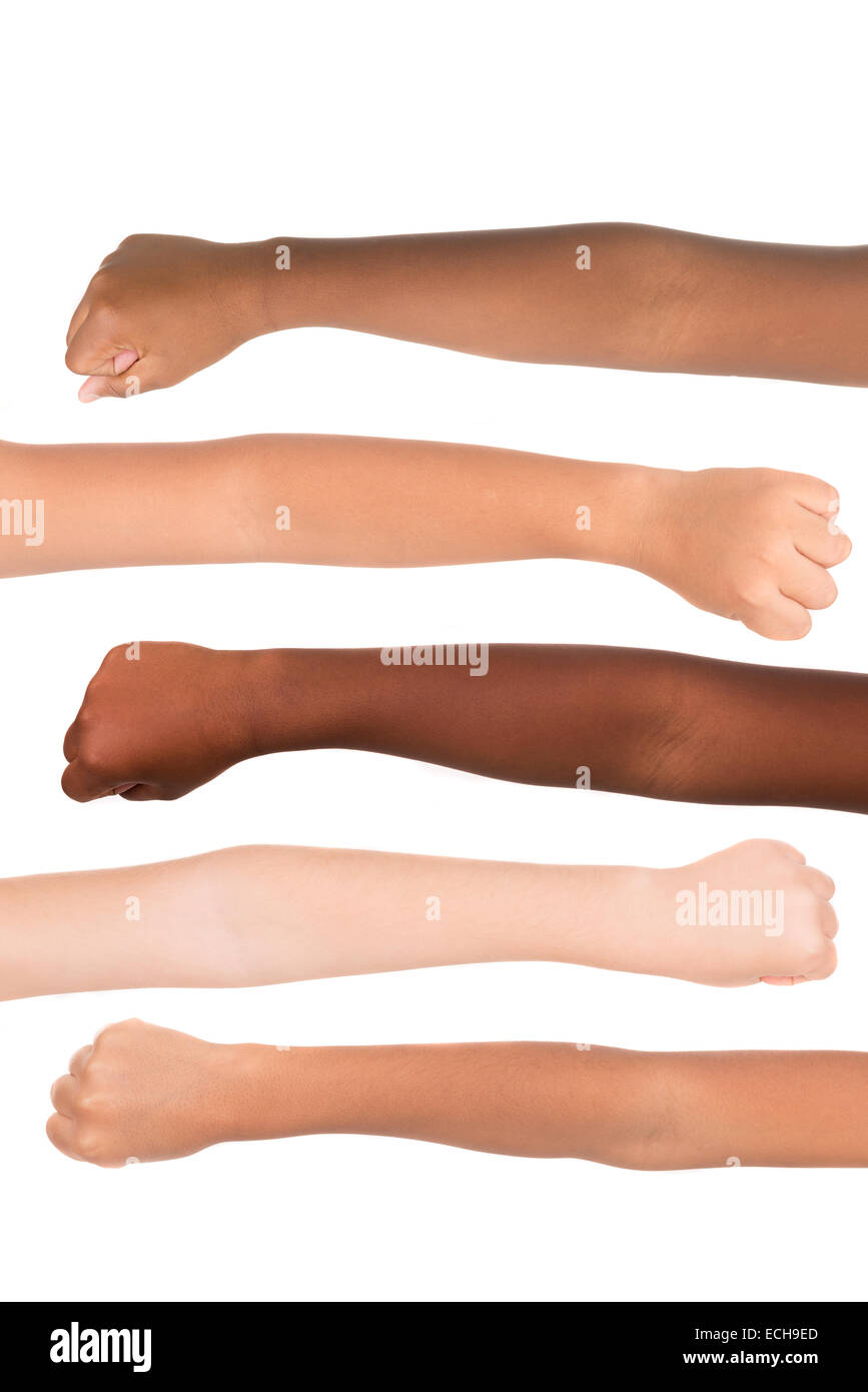 Children's hands from different colors and races together isolated in white Stock Photo