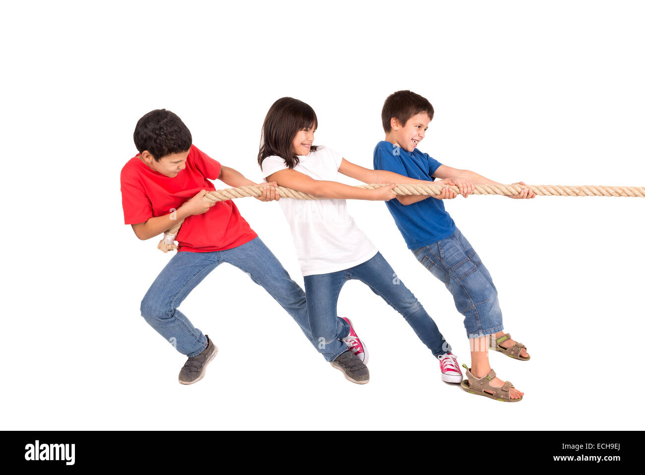 Group of children in a ropepulling contest Stock Photo Alamy