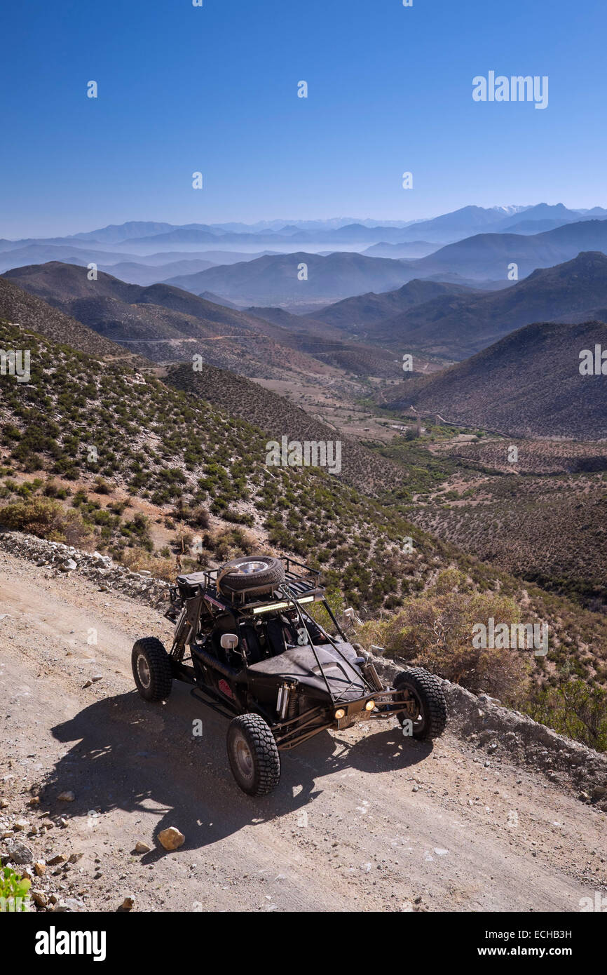 Baja 1000 race car from 'The Gentleman Driver' on a road in Las Chinchillas National Reserve. Chile. Stock Photo