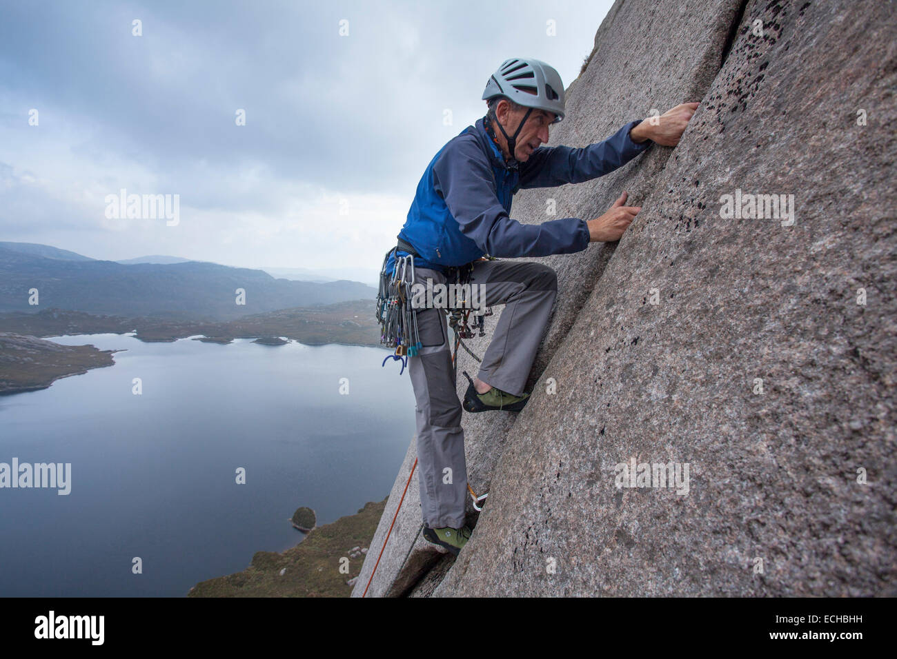 Geoff Thomas rock climbing on Classical Revival (HVS 4c,5a,4c), Lough Belshade, Bluestack Mountains, County Donegal, Ireland. Stock Photo