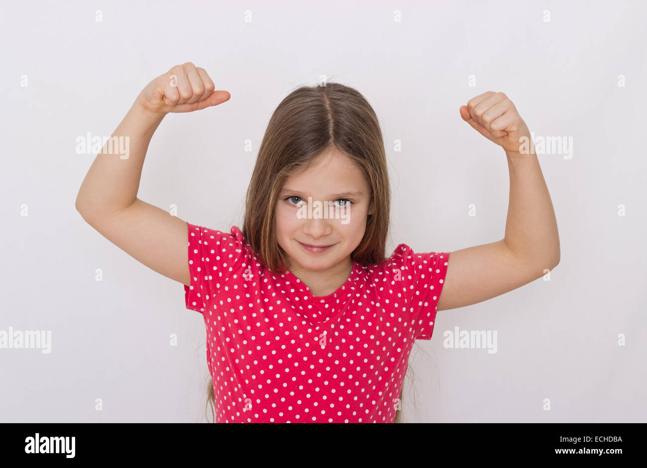 Girl with strong arms Stock Photo