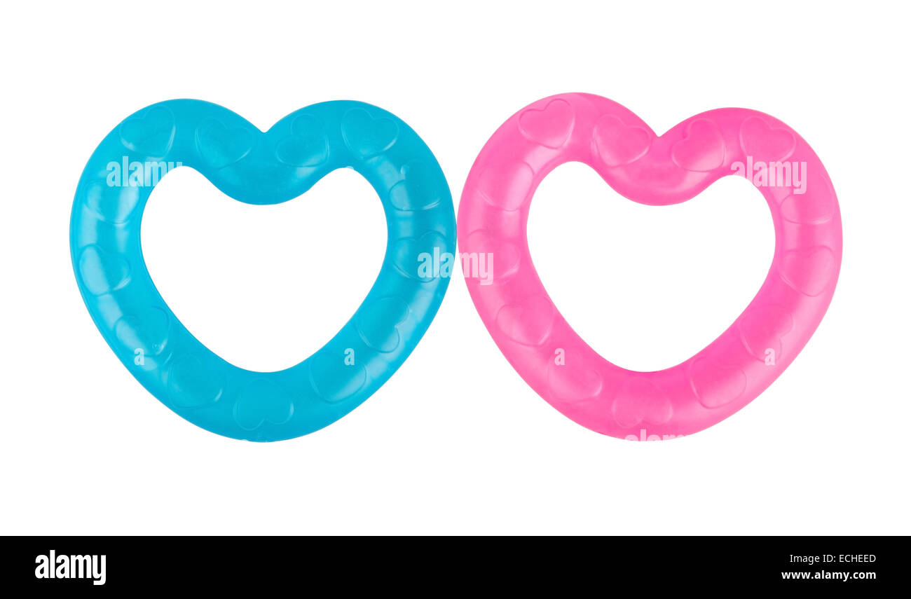 Two heart-shaped teethers. Stock Photo